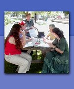 Photo: students at an outside table